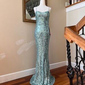 Stunning brand new mint green/blue sequins work all over, size 5 prom dress